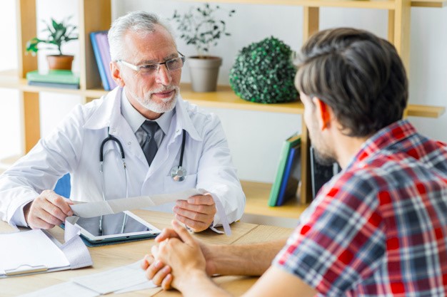 patient with erectile dysfunction consulting a urologist