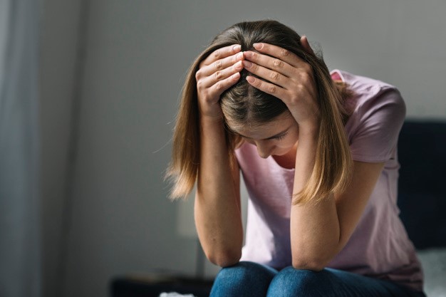 stressed woman experiencing gynecological complications