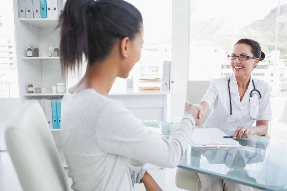 teenager meeting with a gynecologist