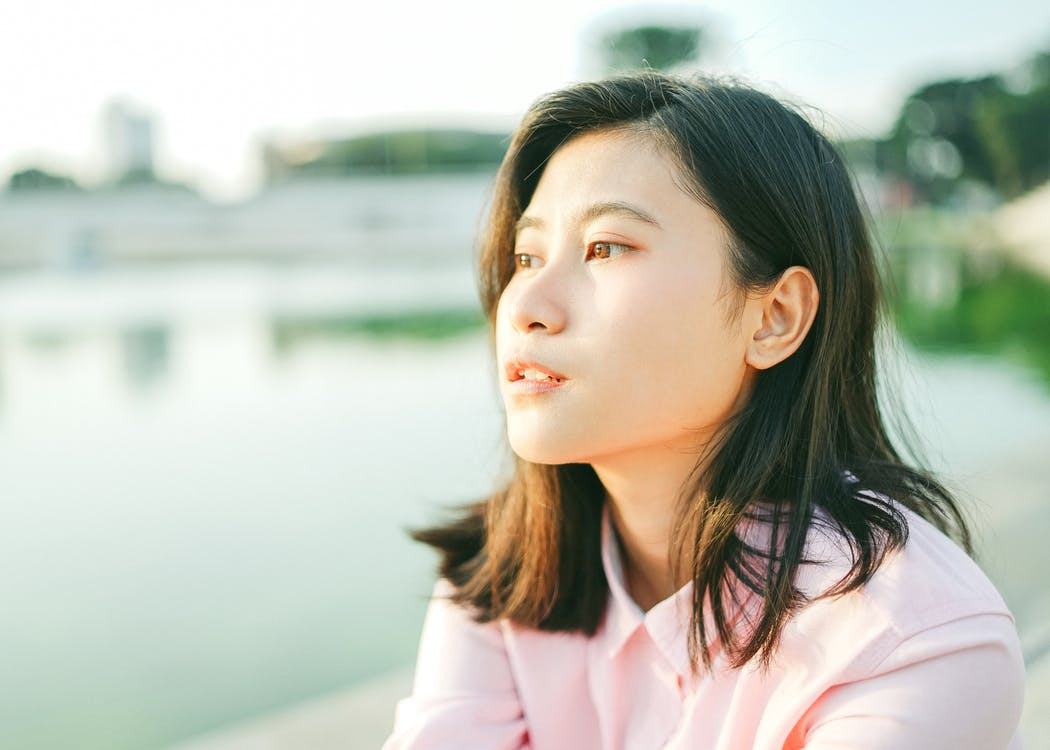 A woman staring into the distance