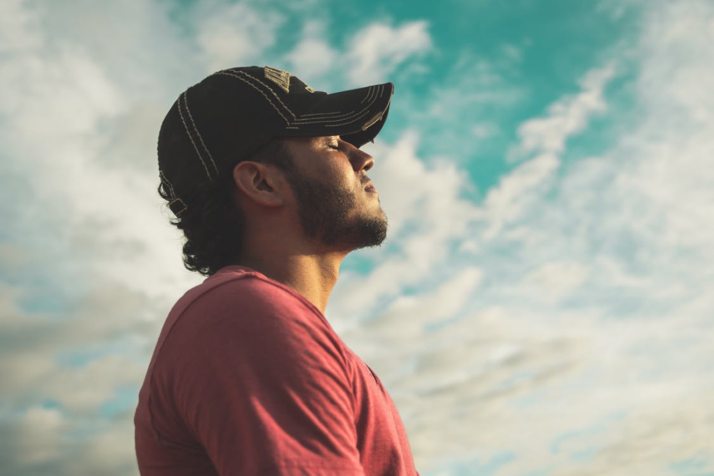 A man breathing in fresh air