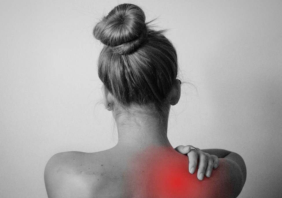 A woman with a shoulder injury