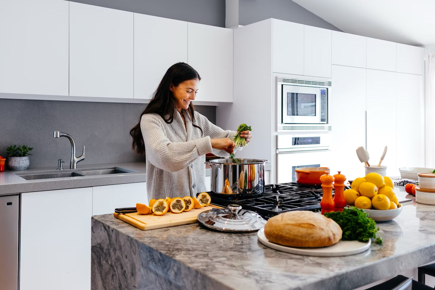 a woman preparing a meal in her kitchen