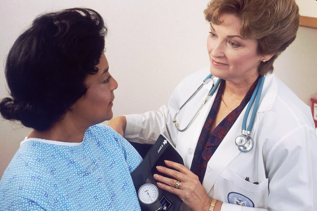 a doctor speaking with a patient