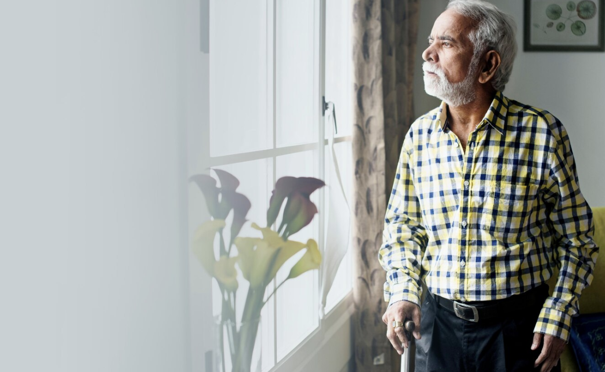 A man at home, recovering comfortably after an ICD implantation procedure.